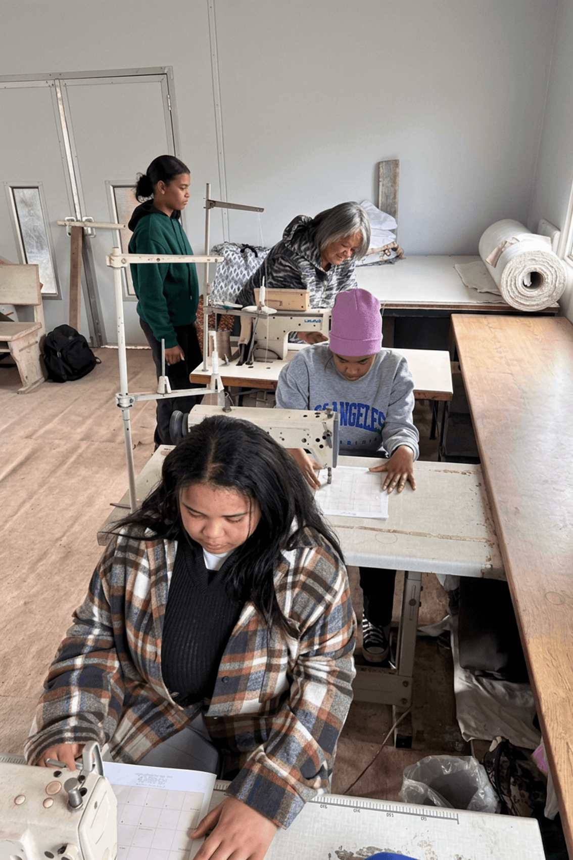 Students practicing stitching